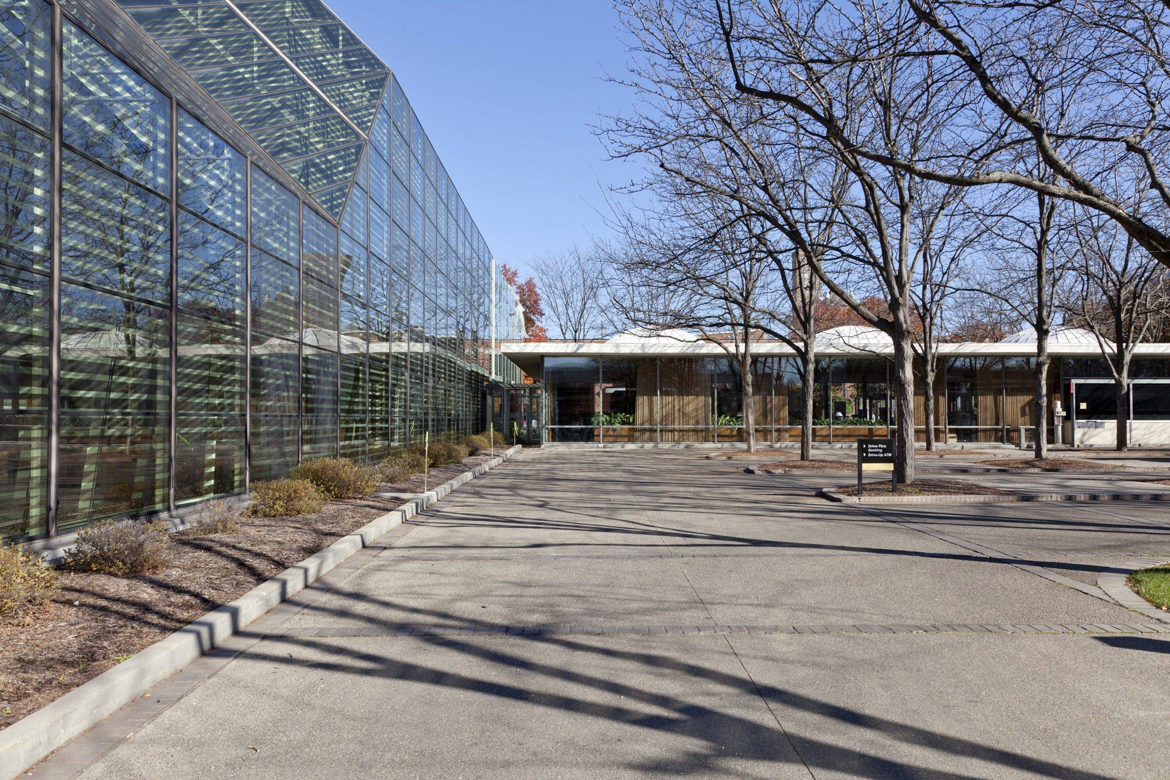 Irwin Union Bank, a low glass pavilion by Eero Saarinen on Washington Street, Columbus, Indiana