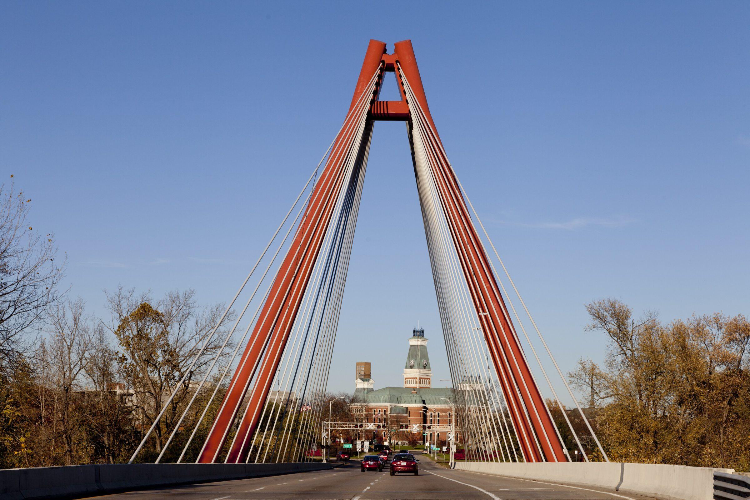 Robert N. Stewart Bridge, a red cable-stayed bridge on the approach into downtown Columbus, Indiana